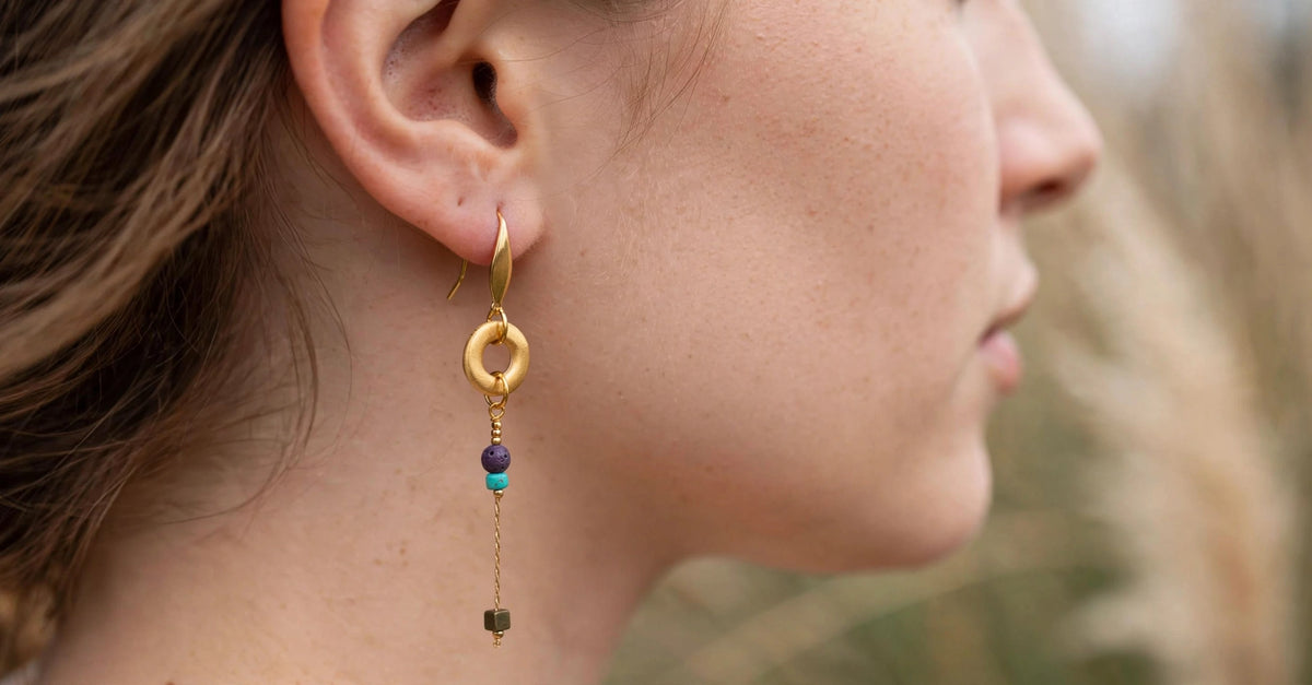 HALO EARRINGS Purple worn on model